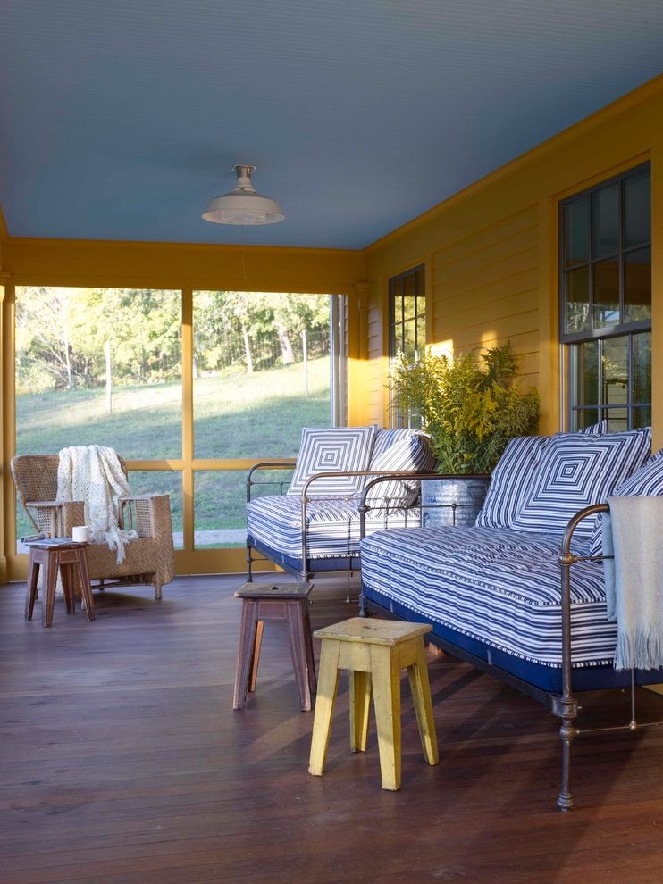 Aa Mattress and Furniture   Farmhouse Porch Also Blue Ceiling Front Porch Ipe Decking Metal Porch Furniture Porch Ceiling Reclaimed Decking Screen Porch Vintage Lighting Wicker Furniture Yellow and Blue