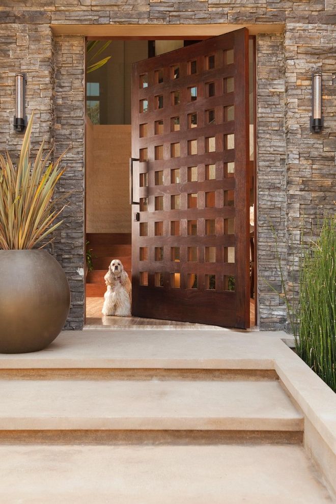 Aaa Huntington Beach   Rustic Entry Also Container Plants Dog Entrance Entry Frank Loyd Wright Front Door Horsetail House Numbers Mid Century Modern Neutral Colors Outdoor Lighting Planters Potted Plants Ramon Ebove Rustic Stairs Steps Stone Wall