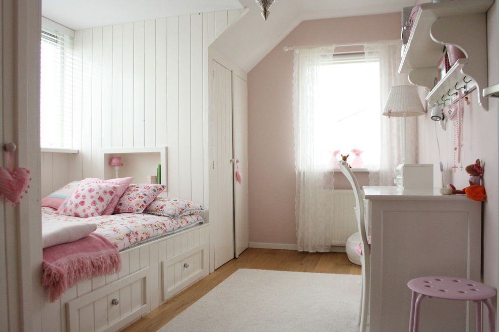 Alvin Hollis   Contemporary Kids  and Angled Ceiling Bedroom Storage Feminine Floral Girls Room Girly Lace Curtains Little Girls Room Nook Bed Paneling Pink Pink Bedding Small Desk Underbed Storage White Desk Wood Planks