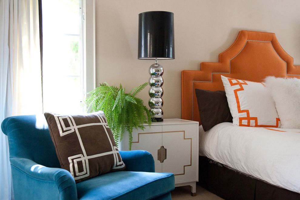 Angled Headboard   Modern Bedroom  and Bed Pillows Bedside Table Bold Colors Colorful Accents Decorative Pillows Ferns Furry Pillows House Plants Nail Head Trim Nightstand Orange Headboard Throw Pillows Turquoise Armchair Upholstered Headboard
