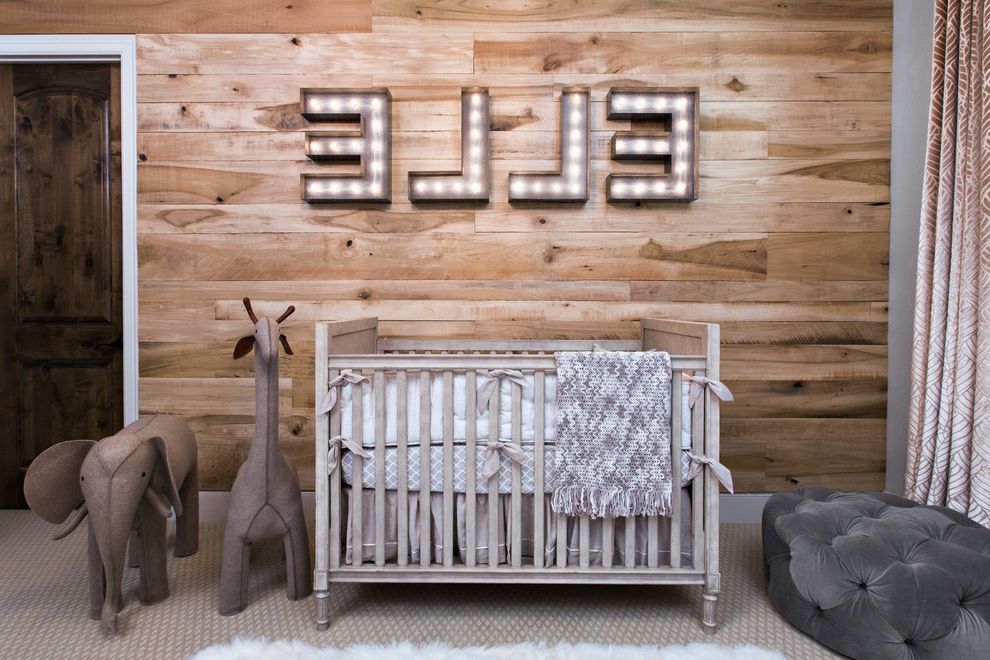 Animal Control Pueblo Co with Transitional Nursery  and Crib Letters on Wall Light Up Letters Stuffed Animals Tufted Ottoman Wood Panel Wall