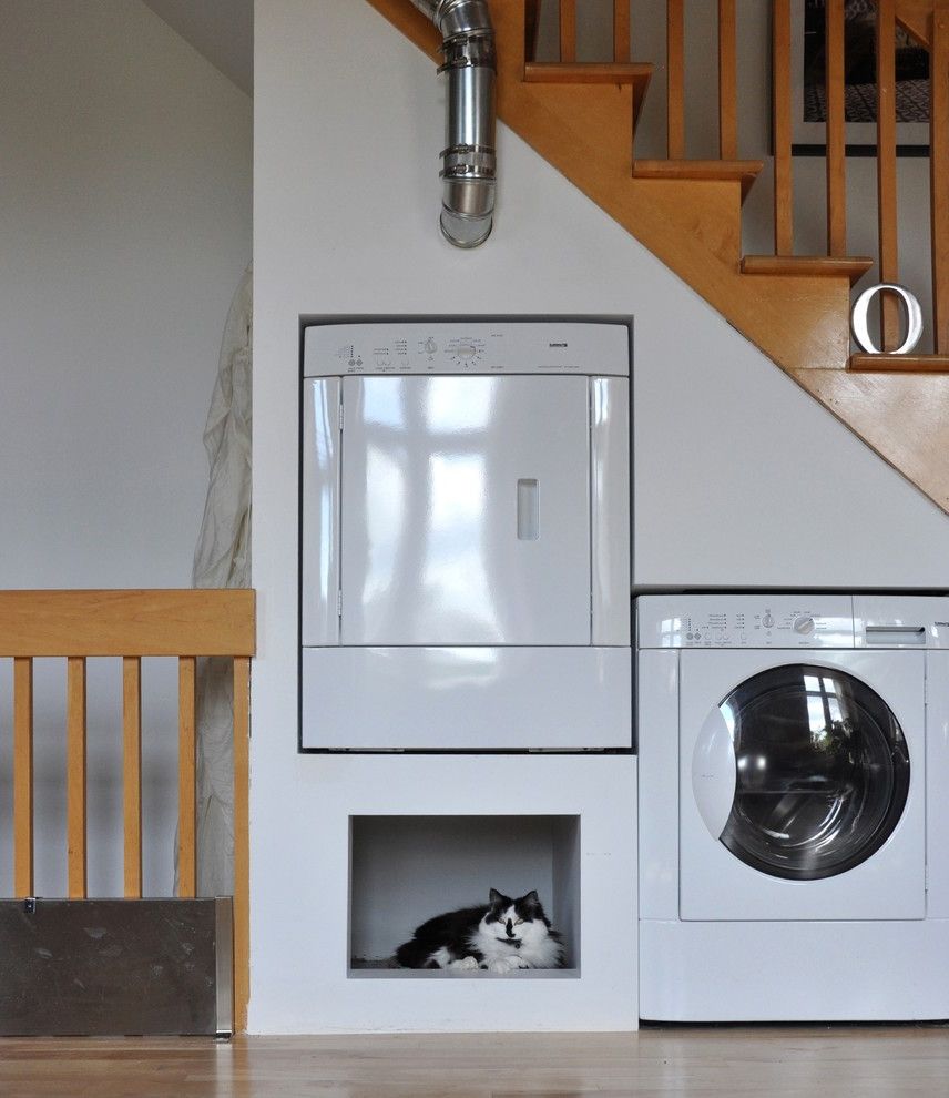 Appliance Solutions Tulsa   Eclectic Laundry Room Also Built in Cat Bed Built in Pet Bed Cat Nook Dryer Laundry Pet Space Stair Under Stair Laundry Under Stair Storage Washer White Appliances White Dryer White Washer Wood Railing Wood Stair Railing