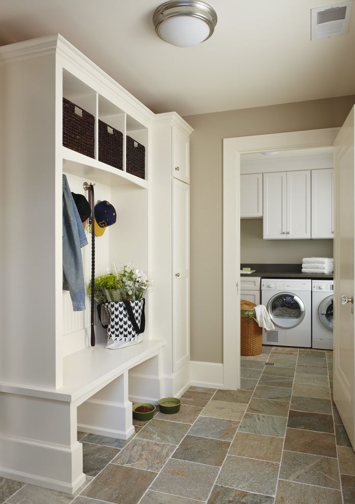 Best Place to Buy a Sectional   Traditional Laundry Room  and Beige Walls Built in Shelves Ceiling Lighting Flush Mount Sconce Front Loading Washer and Dryer Mudroom Stone Tile Floors Storage Cubbies White Trim