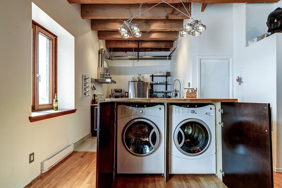 Best Washers 2015 with Industrial Laundry Room  and Converted Loft Exposed Wooden Beams Laundry in Kitchen Open Floor Plan Under Counter Laundry Wood Framed Windows Wooden Counter