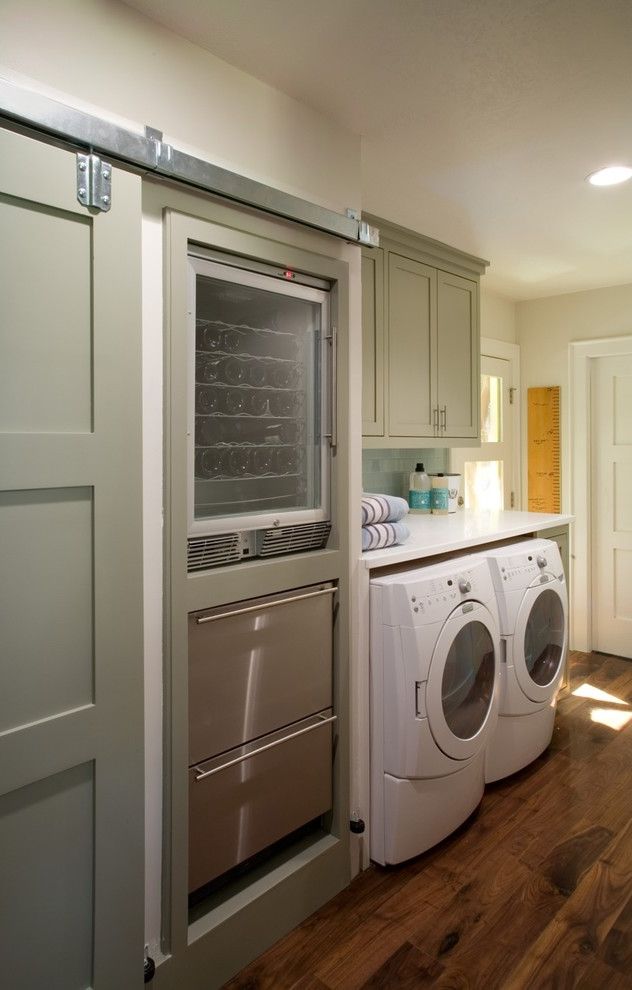 Bosch Wine Cooler with Traditional Laundry Room Also Barn Door Built Ins Front Loading Washer and Dryer Green Cabinets Laundry Room Pantry Shake Cabinets Shaker Style Door Wine Storage Wood Floors