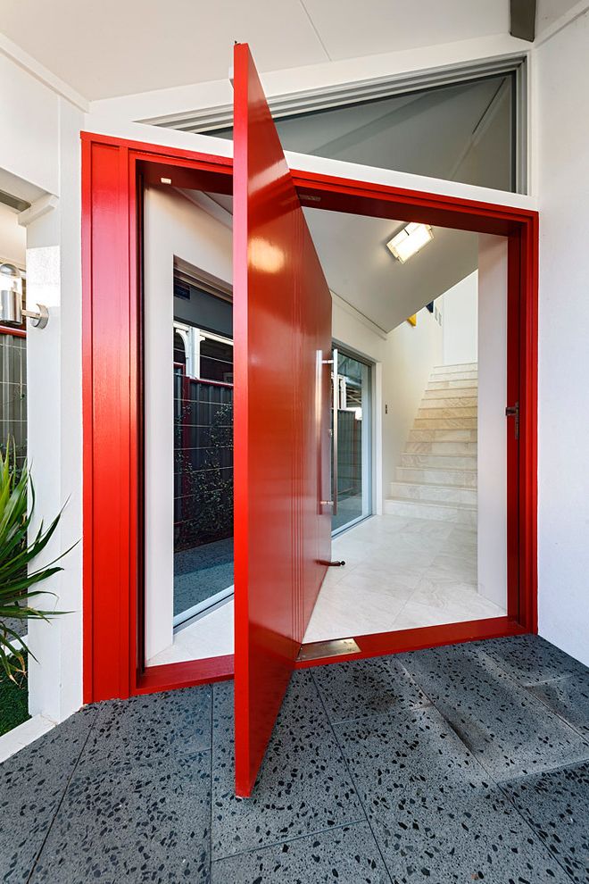 Brushed Nickel Door Stop with Modern Entry Also Aggregate Large Pivot Front Door Red Door Tile Entry Triangular Transom Window White Cladding White Exterior