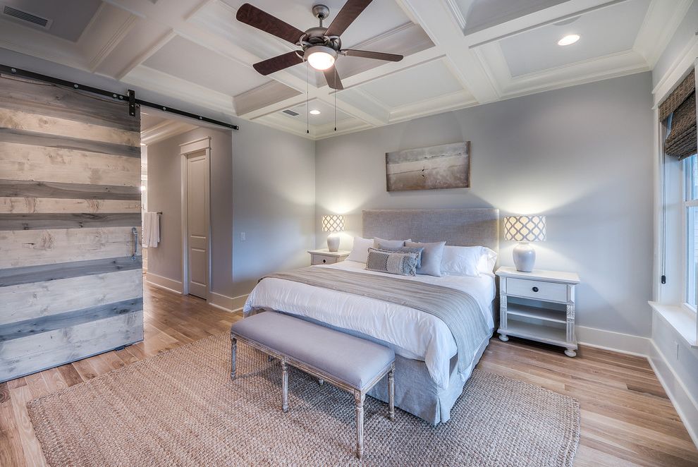 Caldera Springs Rentals   Beach Style Bedroom  and Barn Doors Ceiling Fan Coffered Ceilings End of Bed Bench French Country Gray Bedroom Gray Walls Master Bedroom Quatrefoil Lamp Shade Sliding Doors Symmetry White Nightstand