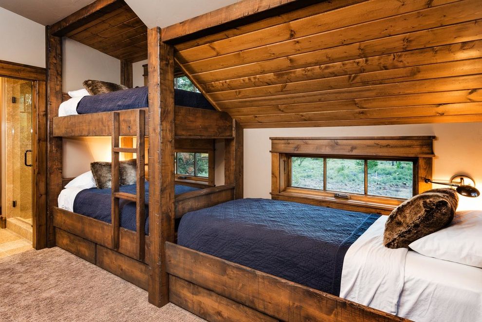 Caldera Springs Rentals with Rustic Bedroom  and Blue Blankets Built in Bunk Beds Fur Pillows Rough Hewn Wood Three Beds Twin Beds