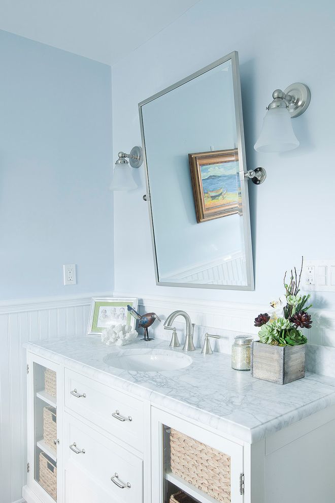 Candle Sconces Pottery Barn   Traditional Bathroom Also Center Pivot Mirror Frosted Glass Wall Sconces Glass Front Cabinets Pottery Barn 54 Console with Glass Door Undermount Sink White Cabinets White Countertop White Wainscoting Wicker Baskets