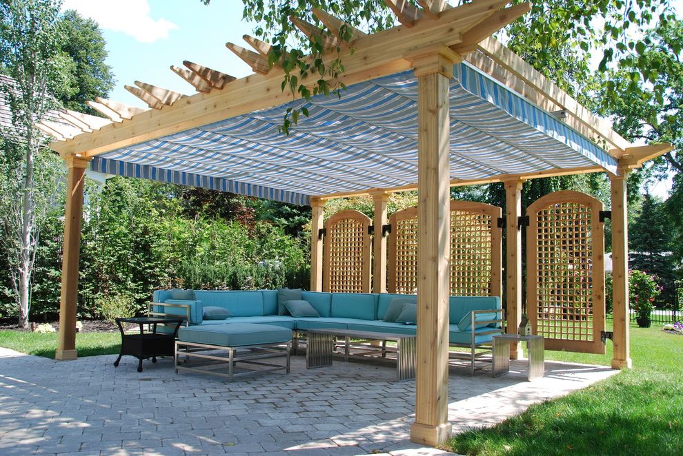 Canvas Factory Reviews   Traditional Patio  and Awning Backyard Blue Canopy Cedar Pergola Grass Lattice Panels Lawn Metal Sectional Pavers Pergola Pergola Shades Retractable Awnings Retractable Canopy Seat Cushions Striped