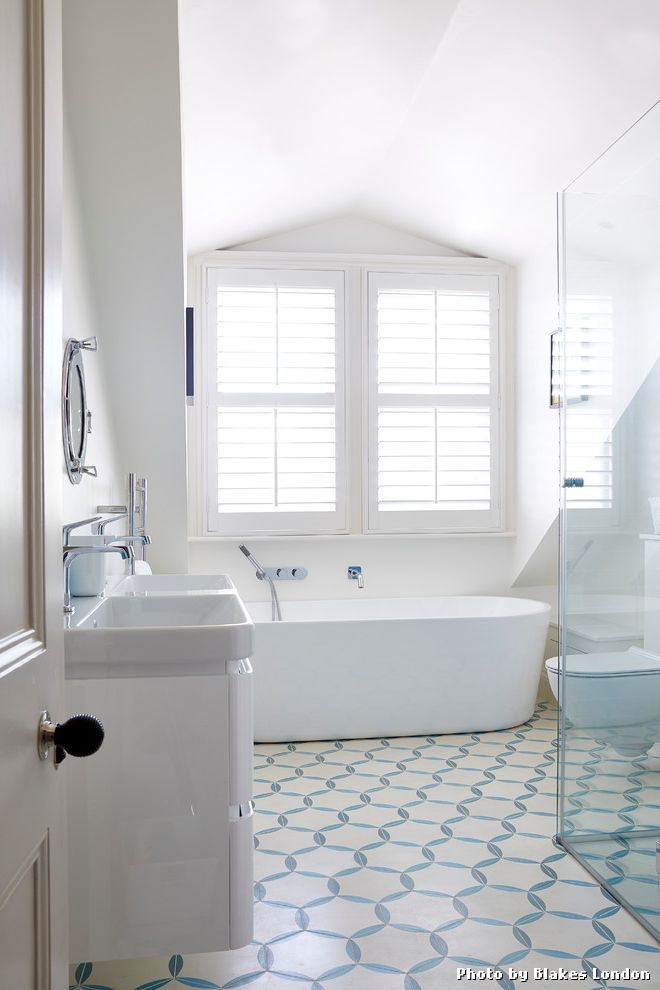 Ceramic Tile Floor Cleaner with Transitional Bathroom and Bathroom Floor Tile Bathroom Shutters Bathroom Tile Blue Blue and White Floor Tile Freestanding Bath Plantation Shutters Pop of Color Subtle Vaulted Ceiling White Bathroom