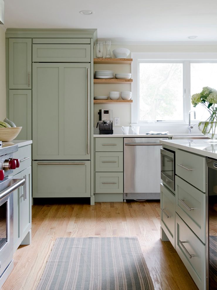 Coloured Fridges   Traditional Kitchen Also Candlelight Cabinetry Floating Shelves Hiding the Refrigerator Microwave in the Island Paneled Refrigerator Sage Green Cabinets Striped Runner Under Counter Microwave White Countertop