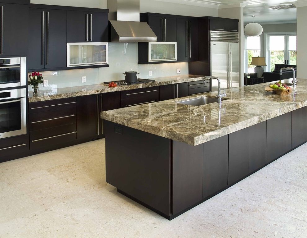 Countertops Jacksonville Fl   Contemporary Kitchen  and Builder Mark Batson Nc North Ca Dark Stained Wood Cabinets Flush Cabinets Frosted Glass Glass Backsplash Pendant Lamp Stainless Steel Appliances Tile Floor