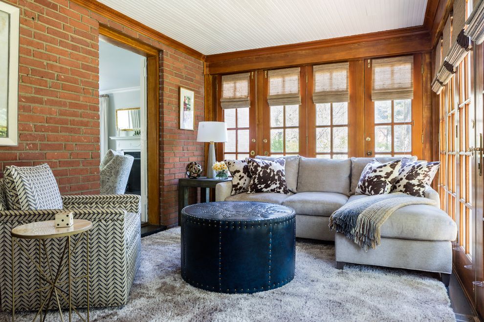 Ennis Furniture Spokane   Traditional Family Room  and Armchair Brick Wall Glass Doors L Shape Sofa Ottoman Shag Rug Side Table