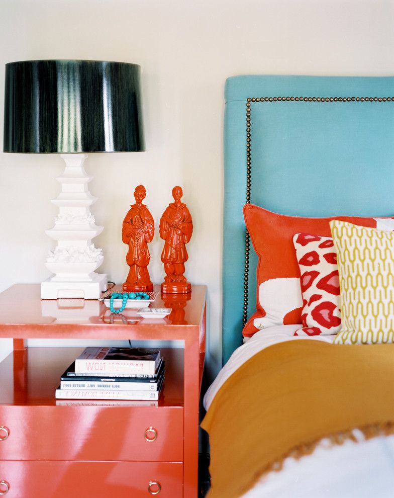Furniture Stores in Baton Rouge   Eclectic Bedroom  and Accent Colors Bedside Table Bold Colors Bright Colors Decorative Pillows Nailhead Trim Nightstand Orange Sculpture Statue Table Lamp Throw Pillows Turquoise Upholstered Headboard