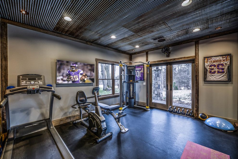 Gladiator Flooring   Rustic Home Gym  and Black Concrete Flooring Central Minnesota Concrete Flooring Cork Gym Lodge Minnesota Mn Reclaimed Beams Rusty Saint Augusta Sartell Shaker Beige Wall Color Tin Ceiling Werschay Werschay Homes Work Out