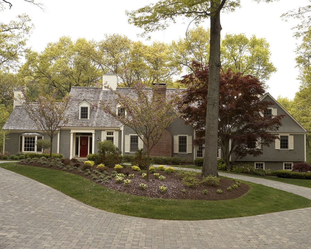 Grey House White Shutters   Traditional Exterior  and Bay Window Brick Brick Chimney Chimney Cottage Style Flower Bed French Windows Front Entrance Gray Paint Grey Paint Hight Gable Lawn Red Door Red Front Door Roof Shutters White Shutters