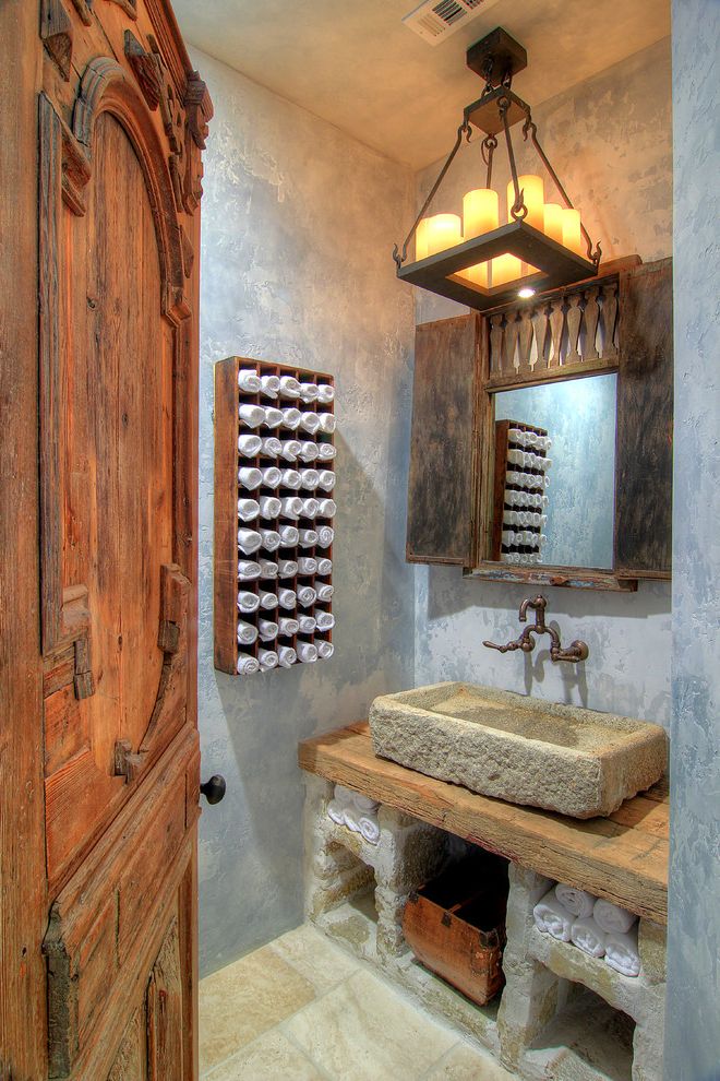 Hand and Stone Port Washington with Mediterranean Powder Room  and Antique Towel Holder Candles Chandelier Reclaimed Wood Vanity Stone Basin Sink Vintage Mirror Wall Mounted Faucet