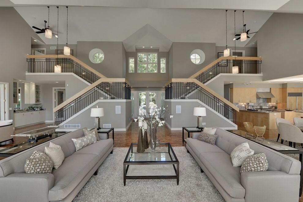 Home Goods Allen with Contemporary Living Room  and All Gray Glass Coffee Table Gray and White Gray Couch Gray Rug High Ceiling Oculus Windows Two Staircases