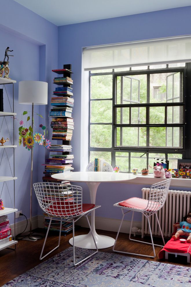 Horizontal Bookshelf with Contemporary Kids  and Area Rug Baseboard Bookshelf Floor Lamp Lavender Mobile Pedestal Table Purple Walls Toys Wall Radiator Wire Chairs Wood Floor