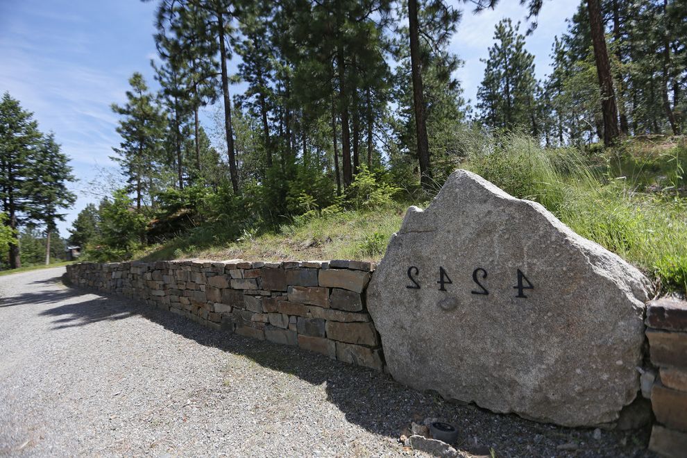 Houses for Sale in Spokane Valley with Traditional Landscape Also Address Gravel House Numbers Ledgestone Retaining Wall Signage Spokane Washington