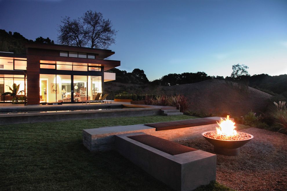 How to Make a Propane Fire Pit with Modern Landscape Also Bench Concrete Bench Concrete Patio Exterior Flat Roof Gravel Large Window Pool Siding
