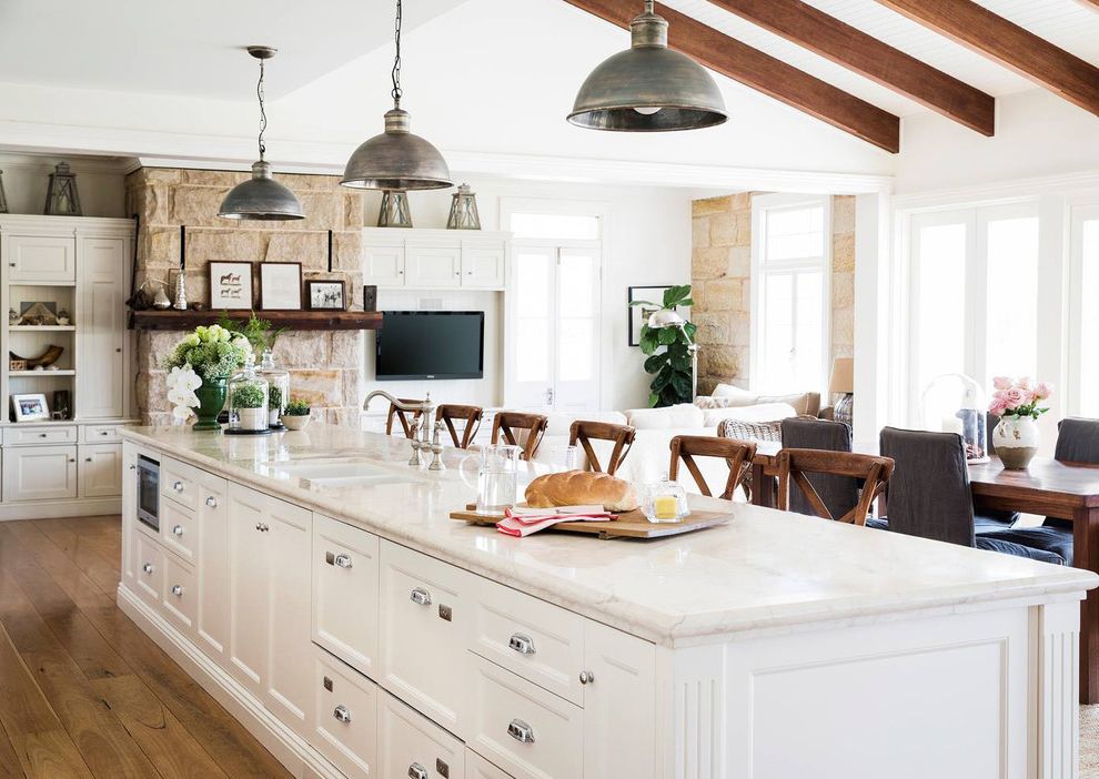 Ikea in Long Island with Farmhouse Kitchen Also Large Kitchen Island Long Kitchen Island Paving Pendant Lighting Rustic Kitchen Sloped Ceiling Stones Walling Traditional Kitchen White Cabinets Wood Beams