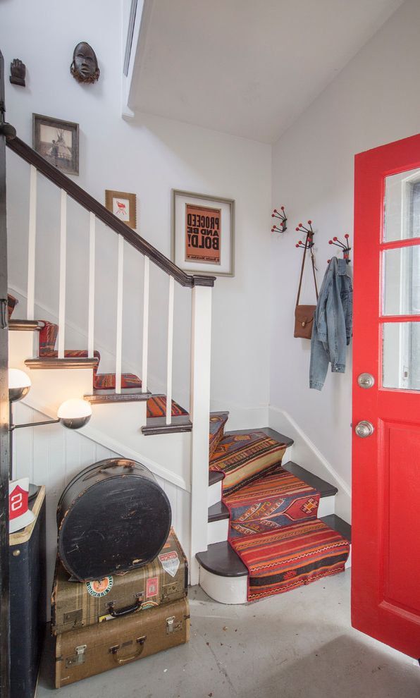 Kess in House   Eclectic Entry Also Bohemian Character Concrete Floor Decorative Trunk Framed Art Geometric Carpet Runner Hall Stair Runners Kilim Kilim Rug Kilim Upholstery Open Shelving Red Door Small Spaces Staircase White Twill Sofa