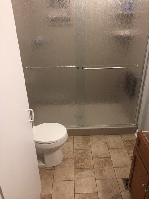 Lowes Beckley Wv   Traditional Spaces  and Crown Molding Culured Marble Shower Custom Lined Cabinets Custom Shower Door Tile Floor