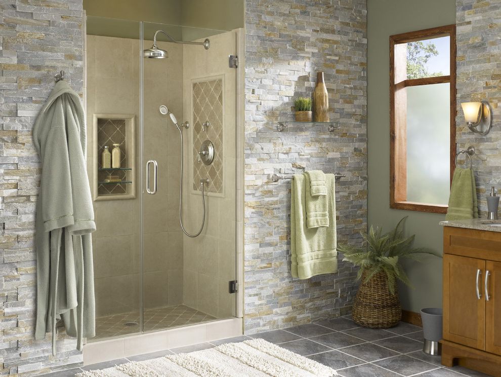 Lowes Southaven Ms with Tropical Bathroom  and Bathroom Bathroom Lighting Bathroom Shelf Floor Tile Flooring Freestanding Vanity Glass Shower Doors Sconce Shower Showerhead Stone Tile Tile Wall Tile Window Trim Wood Wood Trim