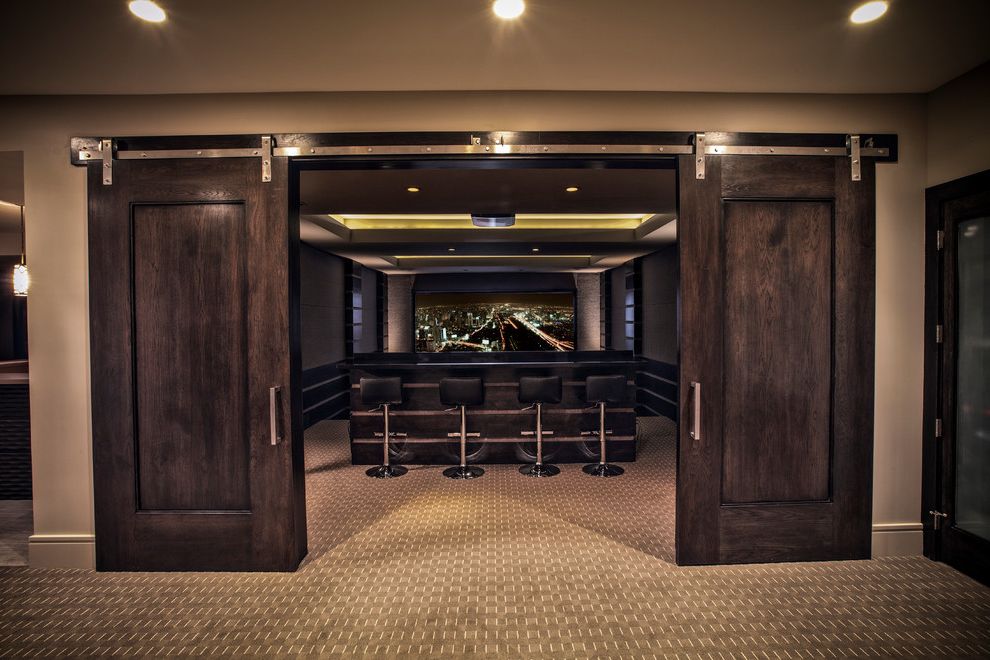 Manassas Movie Theater with Contemporary Home Theater Also Accent Lighting Carpet Counter Seating Counter Stools Cove Lighting Dark Wood Doors Double Doors Home Automation Home Theater Led Lights Media Center Projector Sliding Barn Doors Tray Ceiling