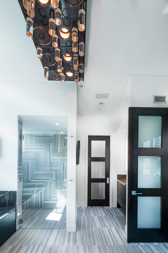 Matte Black Door Handles with Contemporary Bathroom Also Black Marble Backsplash Black Marble Frosted Glass Glass Shower Enclosure Tile Floor Tile Walls Vanity White Walls