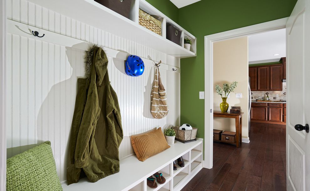Meritage Homes Charlotte Nc with Traditional Entry Also Beadboard Paneling Bench Black Hardware Built in Shelf Closet Cubbies Cushions Floating Shelf Green Painted Wall Hallway Hardwood Floor Hooks Mud Room White Door White Door Casing
