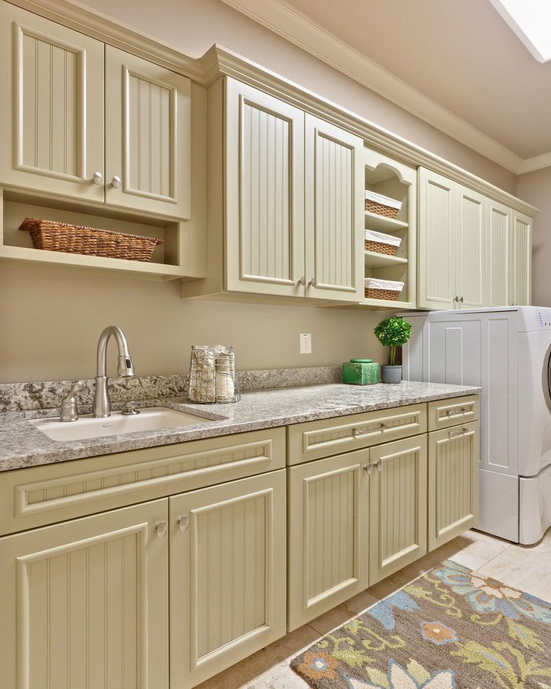 Mid America Cabinets with Traditional Laundry Room and Beadboard Built in Cabinets Neutral Colors Storage Baskets White Wood Wood Cabinets Wood Molding