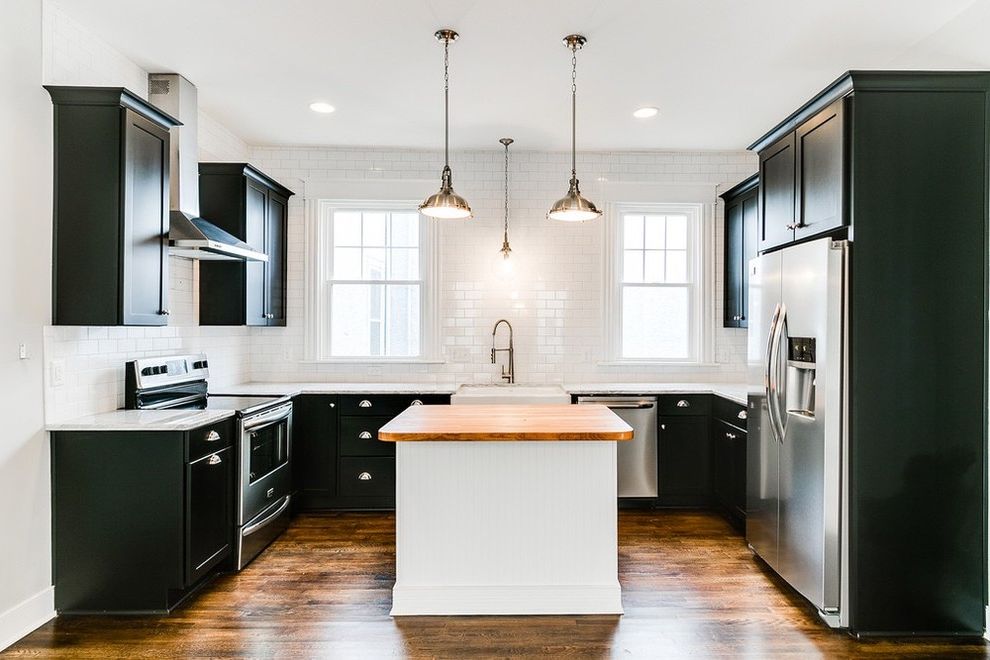 Midsouth Appliances with Shabby Chic Style Spaces and Apron Sink Bath Vanity Chimney Hood Exposed Brick Farm Sink House Flip Industrial Marble Countertops Painted Cabinets Shabby Chic Shaker Stainless Appliances Wood Countertop