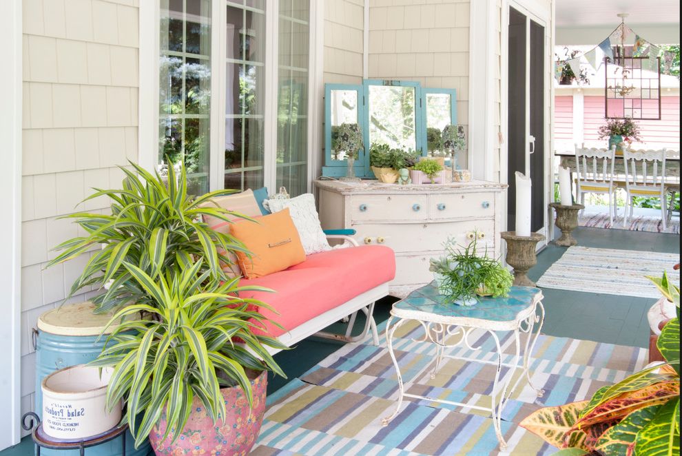 Mor Furniture Sale   Eclectic Porch  and Beige Shingle Siding Blue Painted Decking Gliding Bench Outdoor Rug Potted Plants Screen Door Striped Rug White Dresser