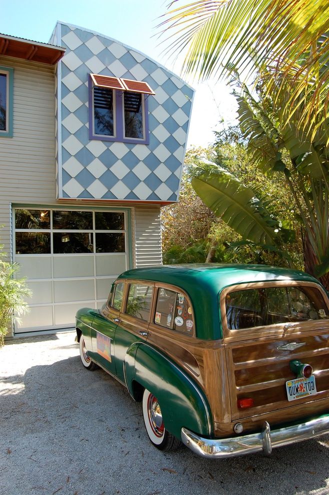 Moving Boxes Menards   Eclectic Exterior  and Artistic Awning Checkerboard Colorful Creative Cladding Fun Funky Garage Door Gravel Drive Gray Lap Siding Light Blue Tropical Plants Vintage Car White