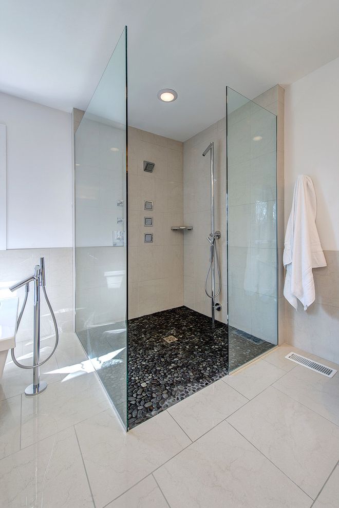 No Threshold Shower with Contemporary Spaces  and Black and White Bath Curbless Shower Frameless Shower Enclosure Jet Sprays Modern Bathroom No Threshold Shower Oversized Shower Pebble Tile Shower Tile Spa Bath White Floor