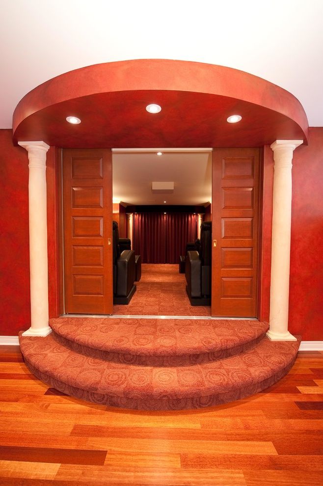 Oakwood Theater   Traditional Home Theater  and Basement Bathroom Design Hardwood Floors Home Theater Renovation Shower Staricase