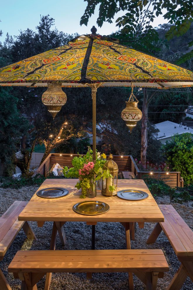 Outside Umbrella Stand   Eclectic Patio  and Dining Bench Moroccan Lanterns Outdoor Dining Outdoor Lighting Paisley Umbrella Wood Table