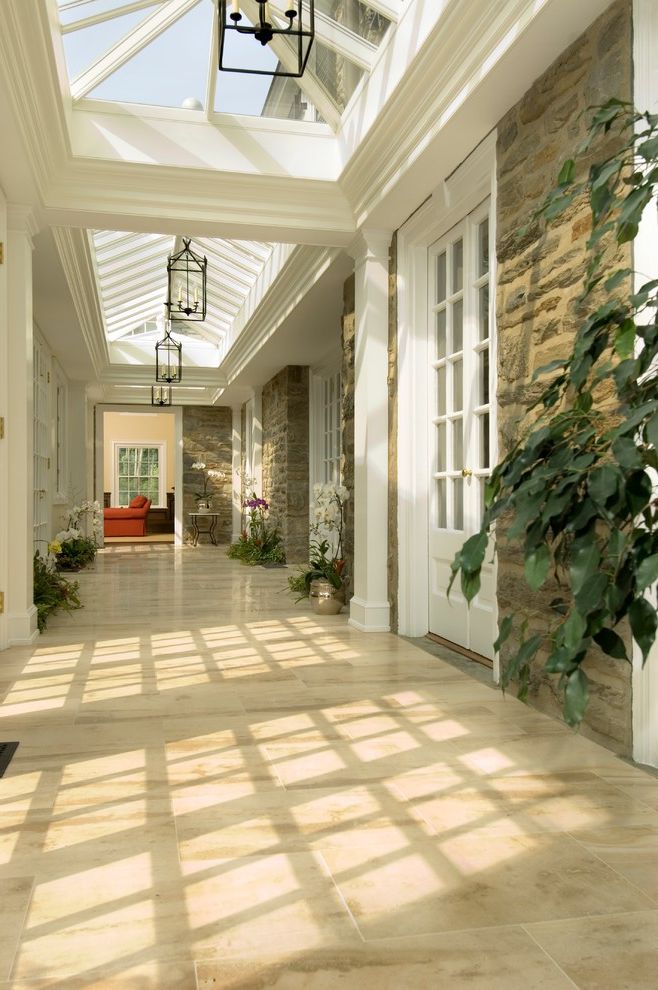 Plumbing Parts Plus with Traditional Hall Also Atrium French Doors Hallway Lanterns Skylight Stonework Tile Floor White Painted Wood