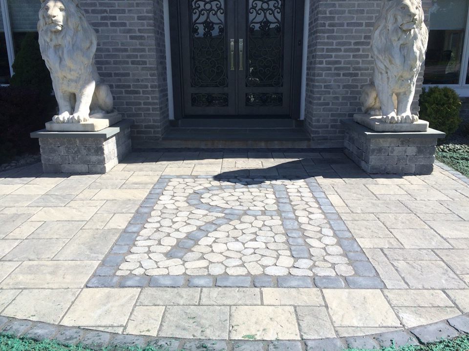 Randazzos   Traditional Entry  and Double Entry Doors Iron and Glass Entry Doors Lion Statues Stone Design Walkway Stone Paver Walkway Stone Pavers Traditional Entry Way