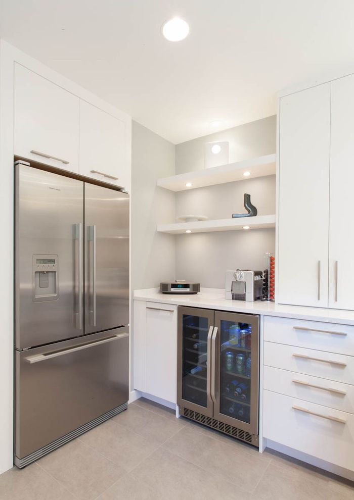 Refrigerator 34 Wide with Contemporary Kitchen Also Beverage Cooler Floating Shelves Flush Cabinets Gray Tile Floor Stainless Steel Appliances Under Cabinet Lights White Cabinets White Counters