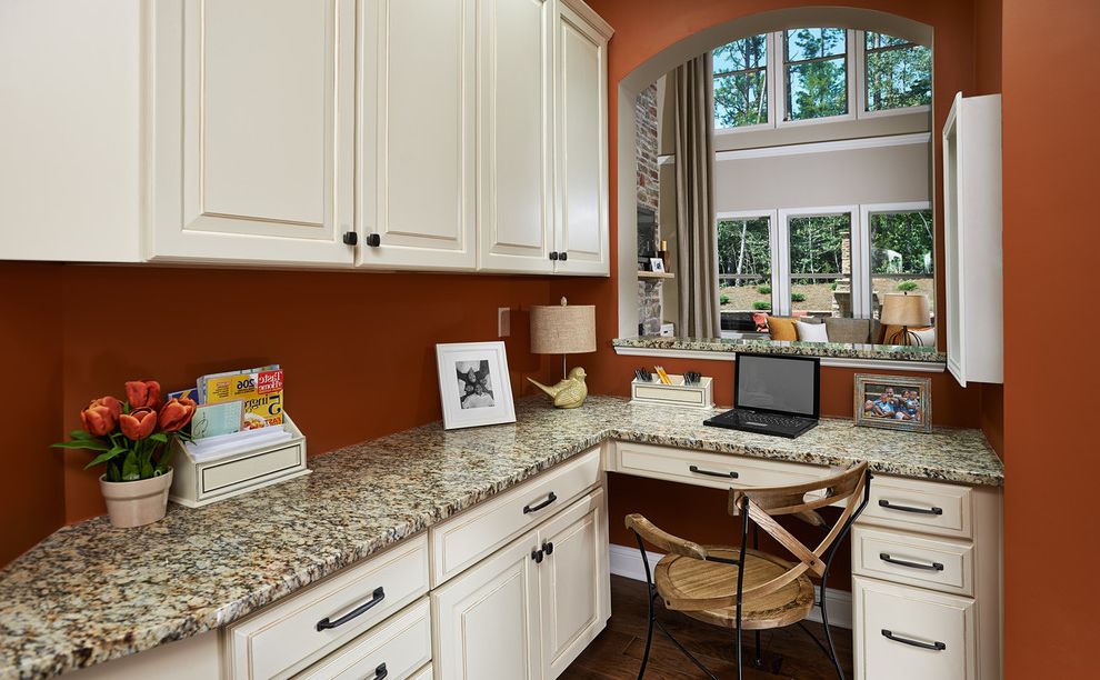 Regent Homes Charlotte Nc   Traditional Home Office  and Alcove Arch Built in Cabinets Built in Desk Burnt Orange Wall Chair Corner Dark Hardware Desk Drawers Nook Pass Through