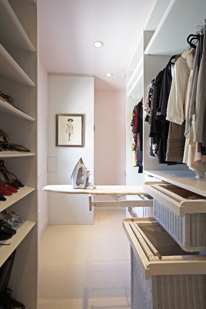 Room and Board Outlet   Contemporary Closet  and Dry Cleaning Basket Hanging Rod Hidden Laundry Center Ironing Board Drawer Pull Out Ironing Board Pull Out Laundry Basket Pull Out Baskets Shoe Rack Shoe Shelves Walk in Closet White Carpet White Shelves