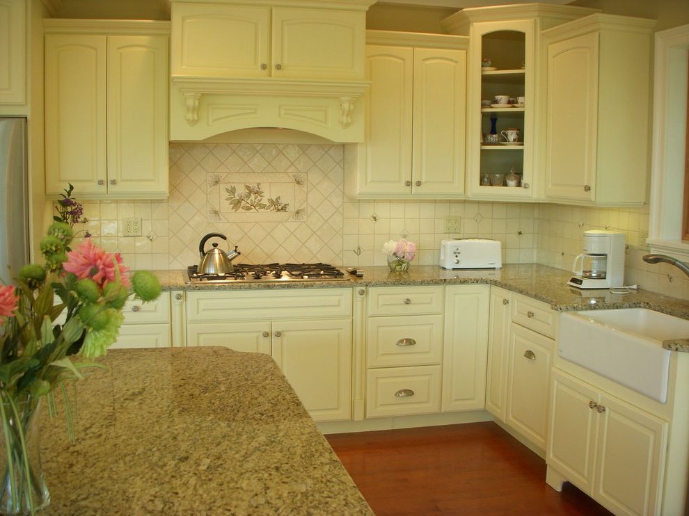 Ruby & Quiri with Traditional Kitchen  and Tile Backsplash and Mirage Hardwood Floo