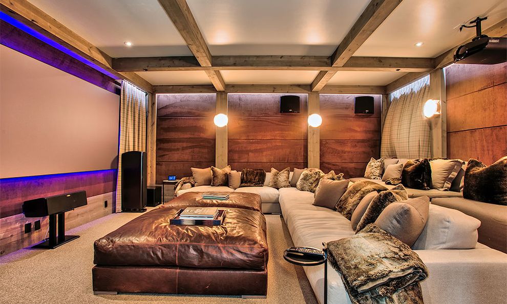 Signature Theater Kalispell   Rustic Home Theater Also Beams Curtains Fur Home Theater Lighting Home Theater Seating Movie Room Ottoman Paneled Walls Pillows Sectionals Speakers Throw