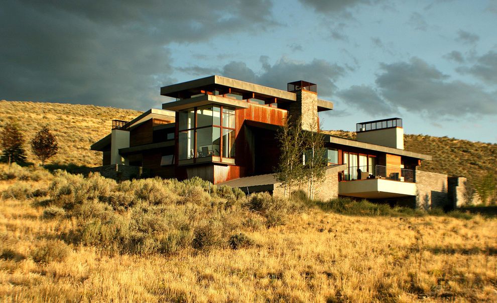 Sky Lodge Park City with Contemporary Exterior  and Clerestory Corrugated Metal Siding Flat Roof Grasses Lodge Modern Ranch Cabin Prairie Roofline Rust Stone Chimney Volumes