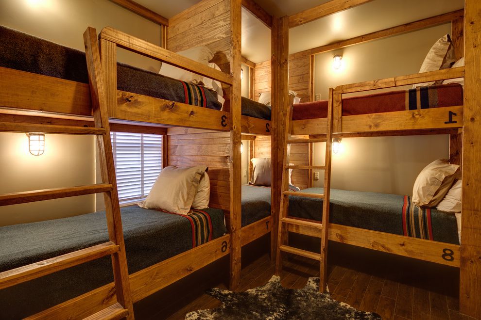 Sleep Number Bed vs Tempurpedic   Traditional Bedroom Also Blue Bedding Built in Bunk Beds Bunk Bed Sconces Bunk Beds Bunk Room Country Interiors Cowhide Hunting Lodge Rustic Bunk Beds Rustic Floors Wall Sconces Wood Bed Wood Floor Wood Ladder