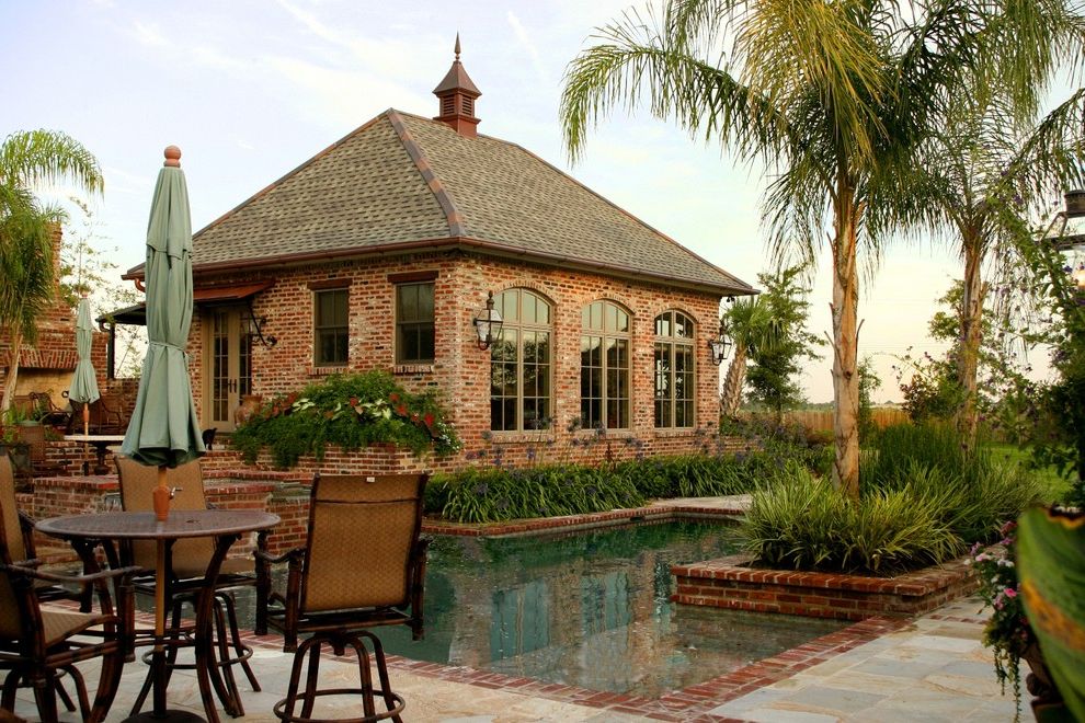 St Pete Housing with Traditional Patio  and Arched Window Brick French Door French Window Garden Furniture Patio Pool Stone